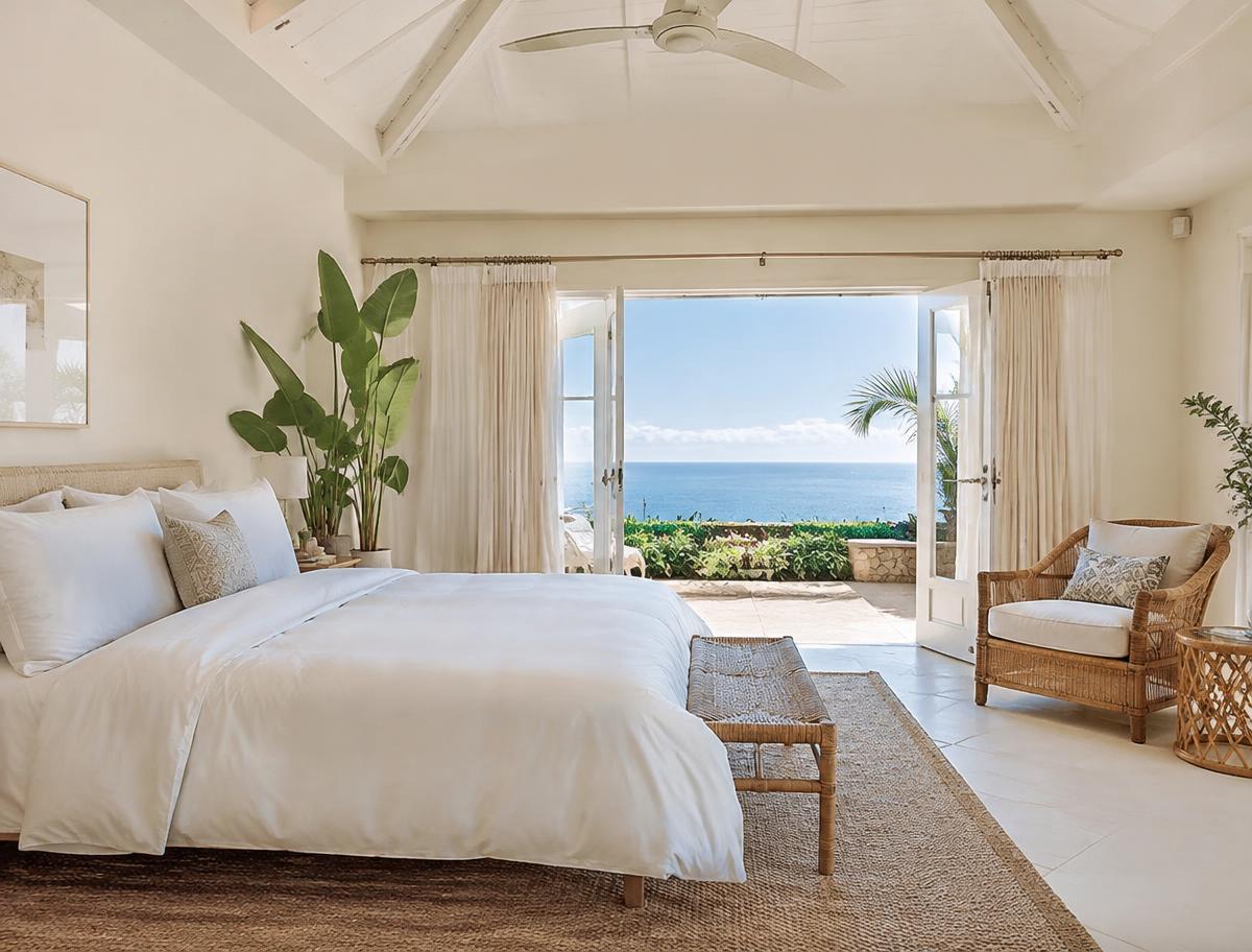 Bright bedroom opening onto an ocean view